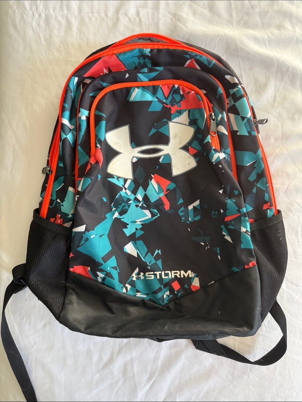 Under Armour Kids/Men’s Black Backpack with Teal & Red Accents